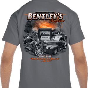 A man wearing a bentley 's t-shirt.