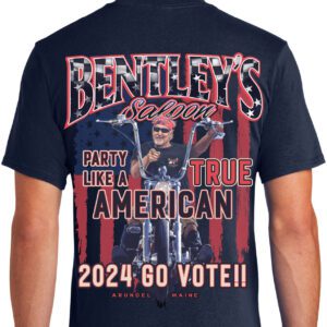 A man wearing a t-shirt with the name bentley 's saloon and party like a true american.