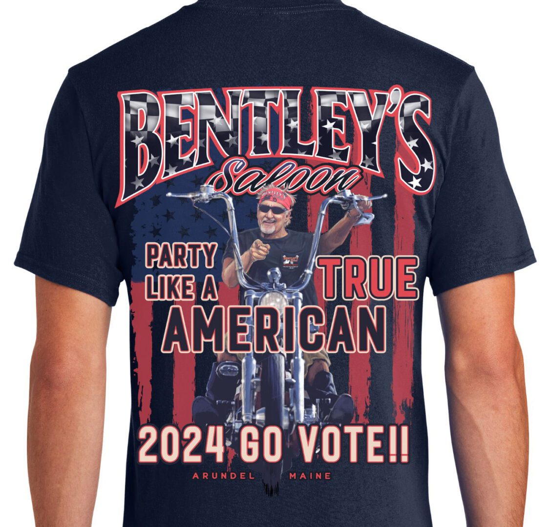 A man wearing a t-shirt with the name bentley 's saloon and party like a true american.