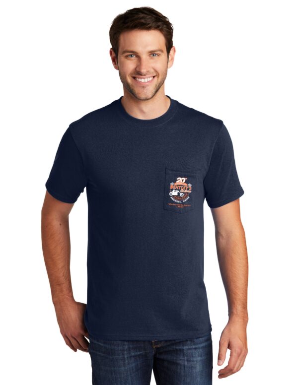 A man wearing a navy blue t-shirt with an image of a cat on it.