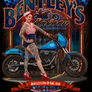 Pin-up style woman posing with a blue motorcycle at Bentley's Saloon.