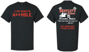 Humorous black T-shirt with bold white and red text and cartoon character.